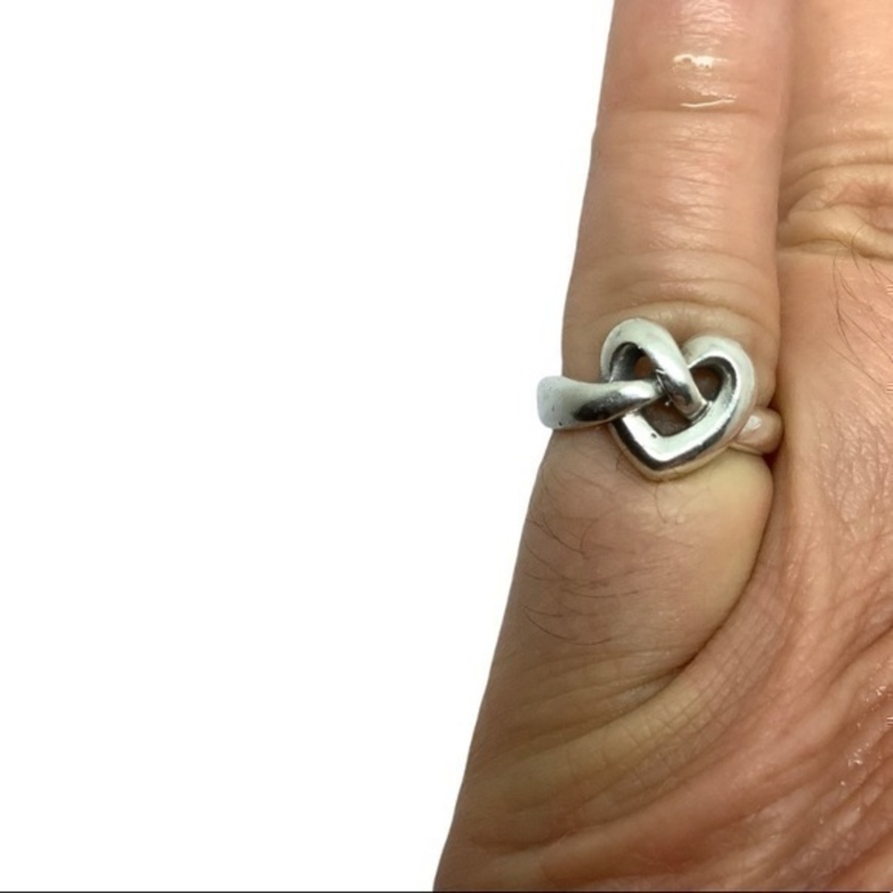- James Avery sterling silver heart shaped ring
